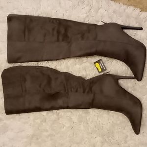 Charcoal gray knee high pointy toe boots.  Brand new with tags and box size 8